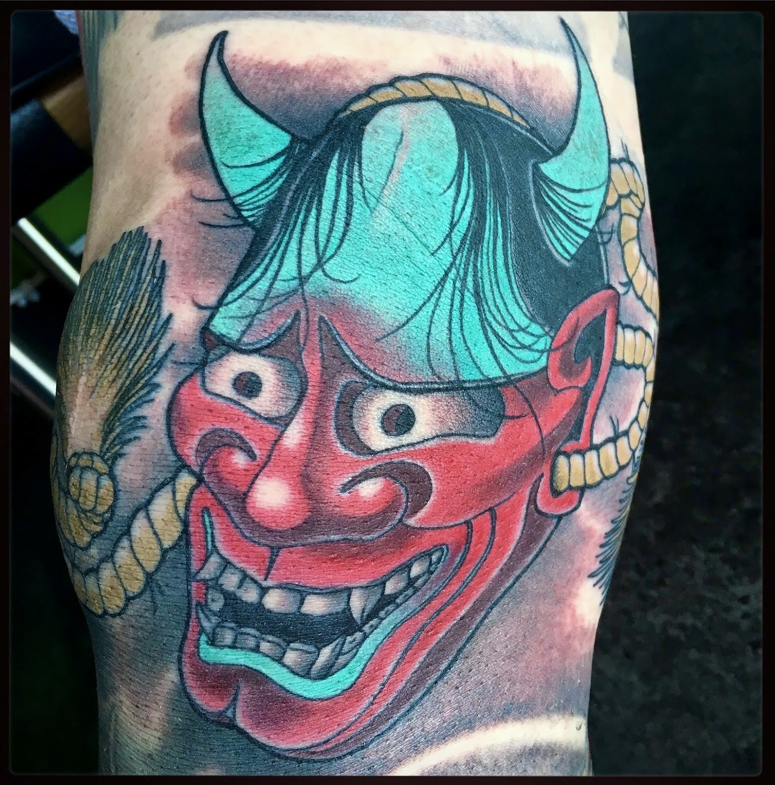 Neo Japanese oriental irezumi colour tattoo of a hannya mask in blue red by Ricks custom tattooing Ricardo Pedro at Nexus Collective