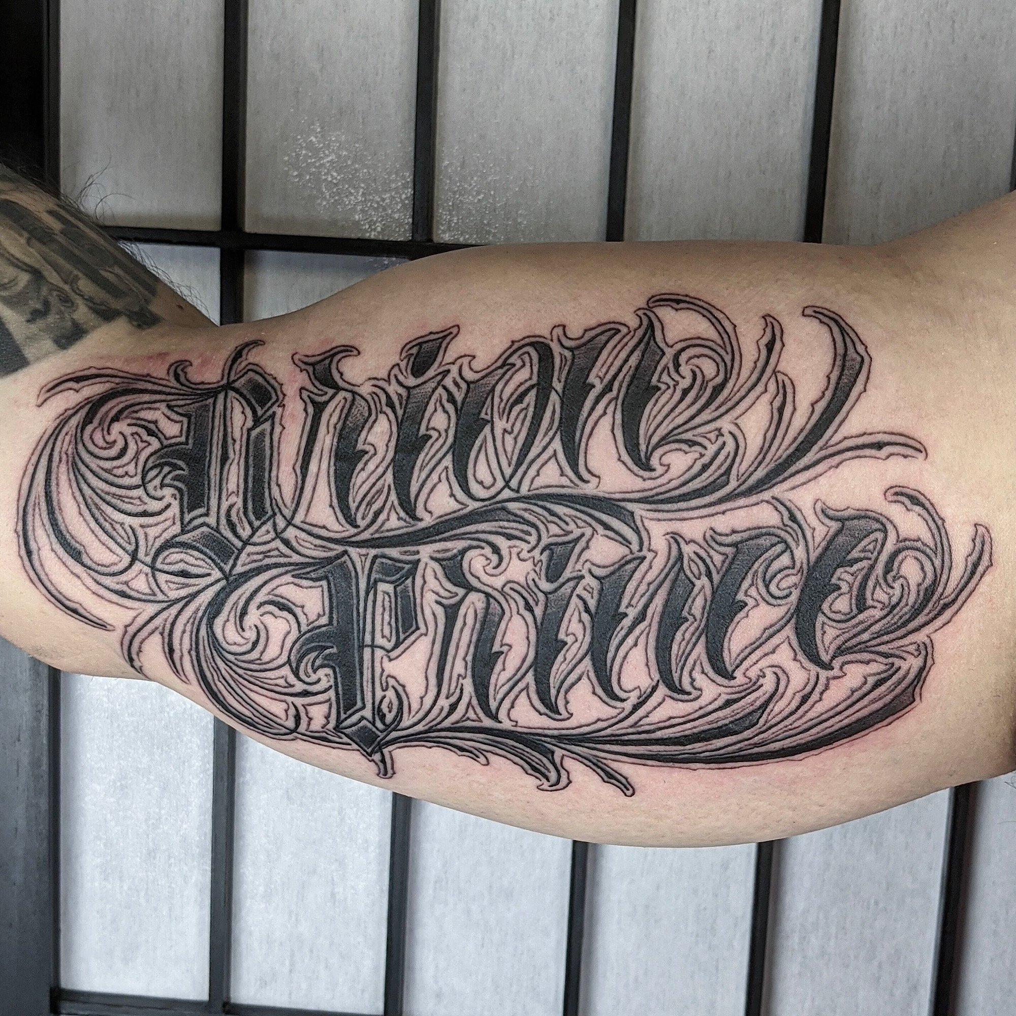 script inside arm orion prince love letters black and grey gray lettering tattoo by Ricks custom tattooing Ricardo Pedro at Nexus Collective