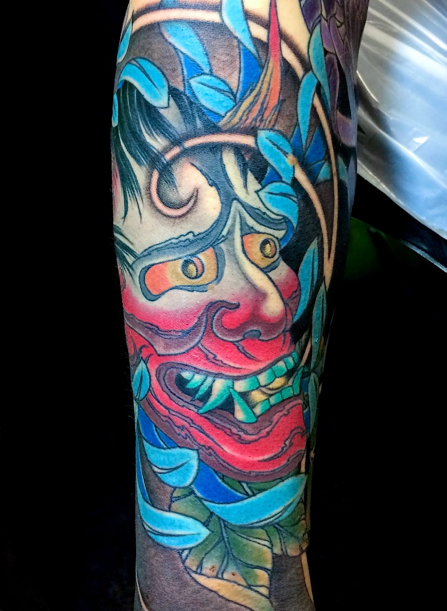 Neo Japanese oriental irezumi colour tattoo of a hannya mask and peony by Ricks custom tattooing Ricardo Pedro at Nexus Collective